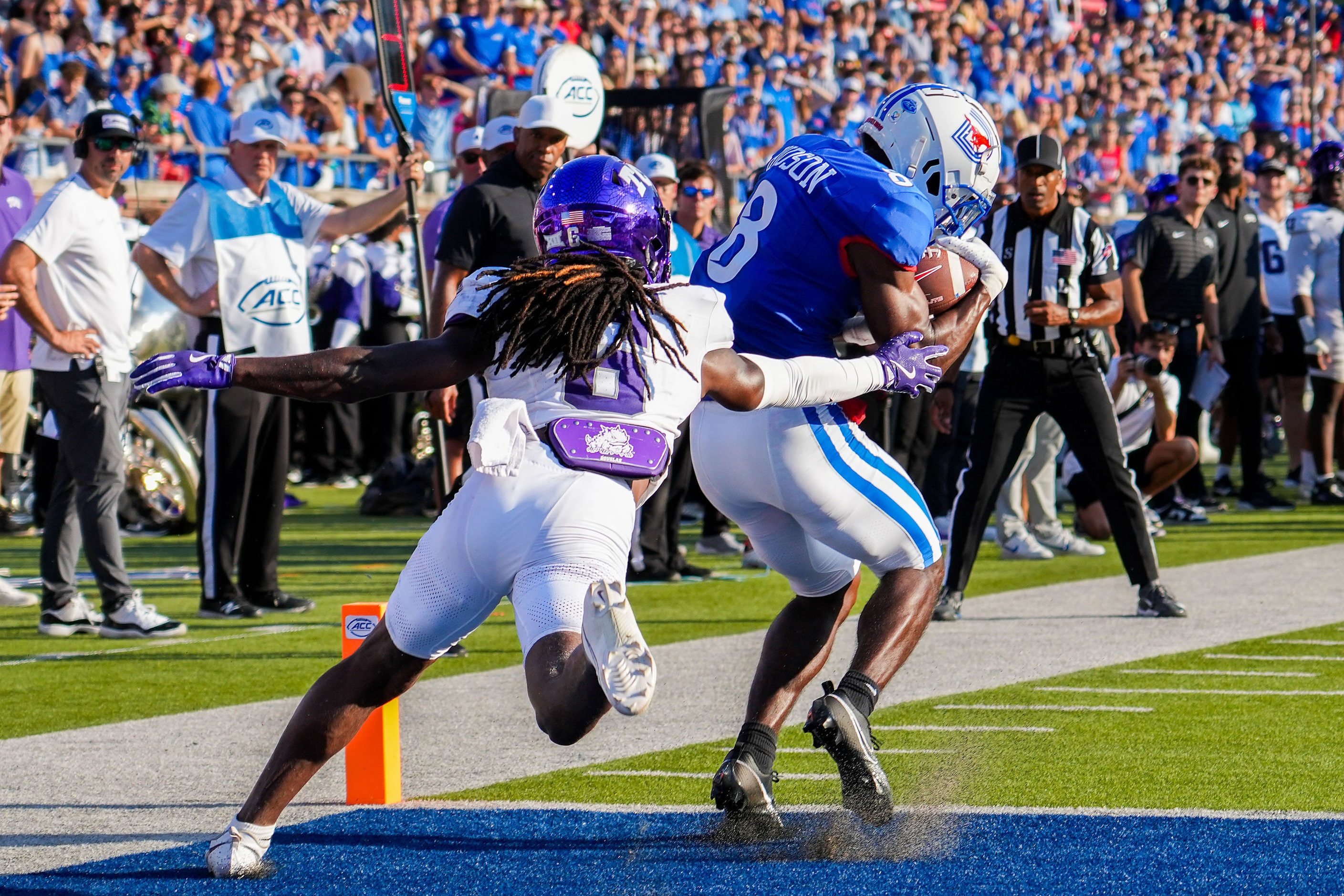 SMU wide receiver Jordan Hudson (8) catches a 10 yard touchdown pass as TCU cornerback...