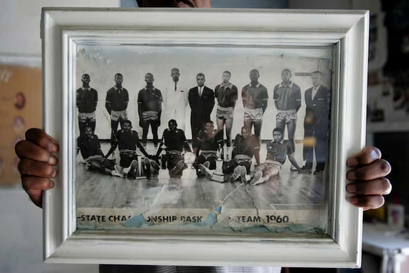 A photograph of the 1960 state championship basketball team at James Madison High School....