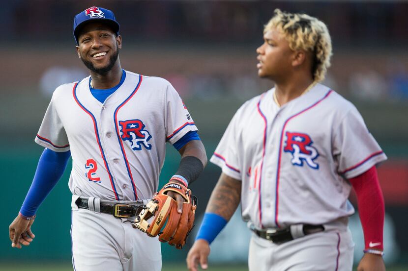 FILE - Jurickson Profar (left) and Willie Calhoun are pictured during a matchup between the...