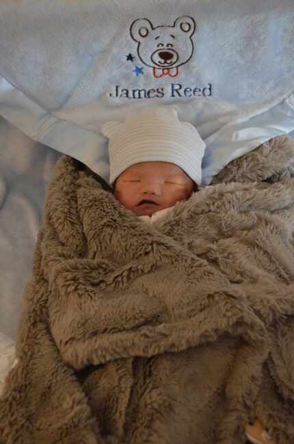 Baby James Reed Ly was wrapped in a blanket in the hospital after being born Jan. 31. He...