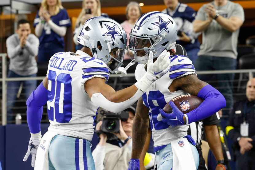 Dallas Cowboys wide receiver CeeDee Lamb (88) celebrates a touchdown with running back Tony...