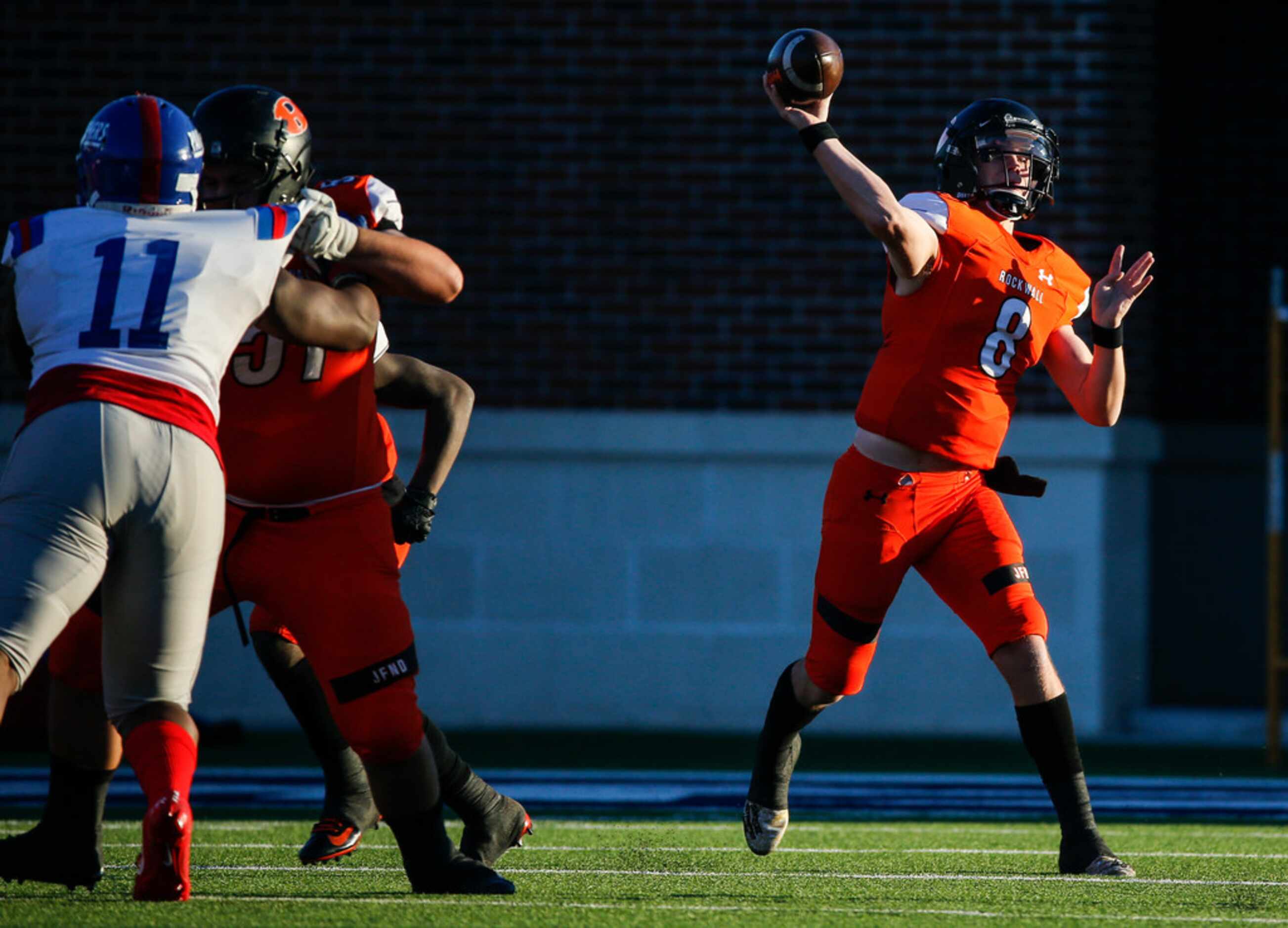 Rockwall quarterback Braedyn Locke (8) fires off a pass during the second half of a Class 6A...