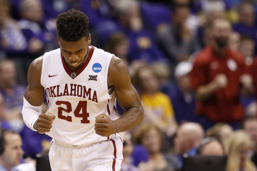 Oklahoma Sooners guard Buddy Hield (24) celebrates after hitting a three pointer during the...