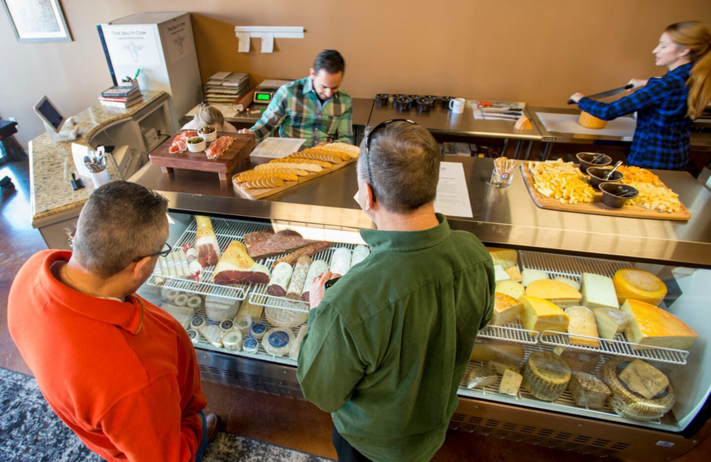 Working behind the counter, Harold Gonzalez and Jennifer Gentry, the couple who own The...