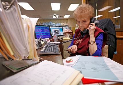 Sales supervisor Sandra White took an order over the phone at McShan Florist in Dallas on...