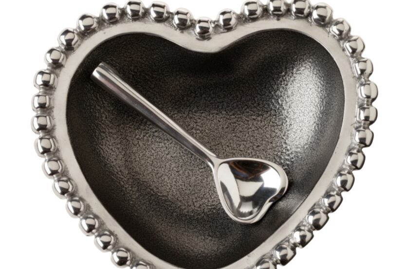 Pewter dish outlined with silver pearls and a heart-shaped spoon. $34 at Culinary...