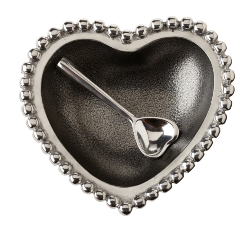 Pewter dish outlined with silver pearls and a heart-shaped spoon. $34 at Culinary...