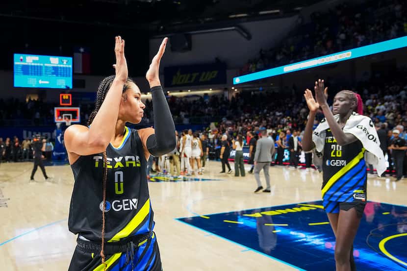 Dallas Wings forward Satou Sabally (0) and center Awak Kuier (28) acknowledge the crowd as...