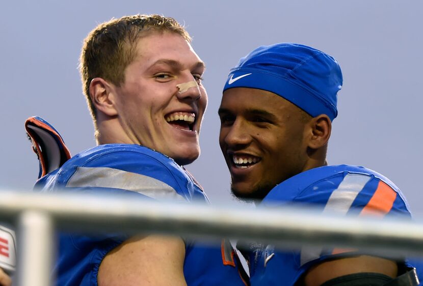 LAS VEGAS, NV - DECEMBER 16:  Leighton Vander Esch #38 and Cedrick Wilson #1 of the Boise...