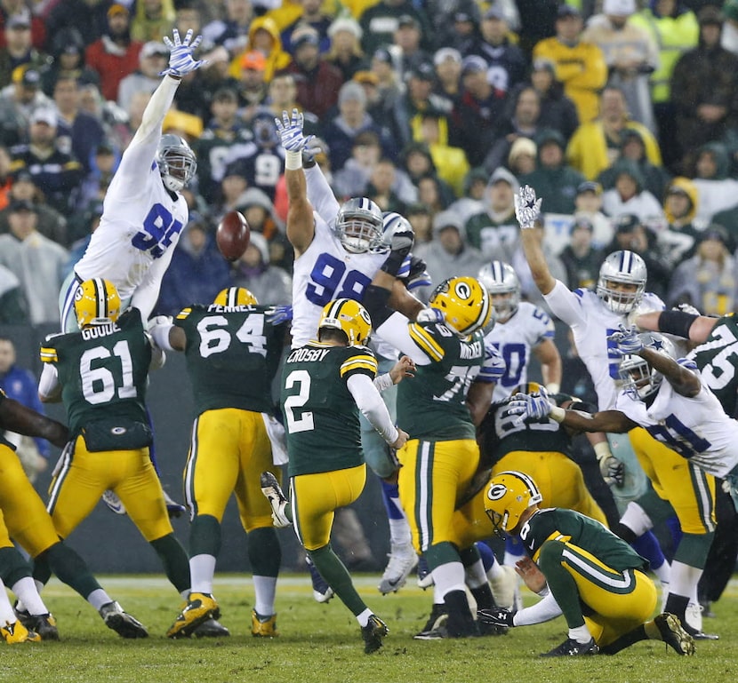 Dallas Cowboys defensive tackle David Irving (95) and defensive tackle Tyrone Crawford (98)...