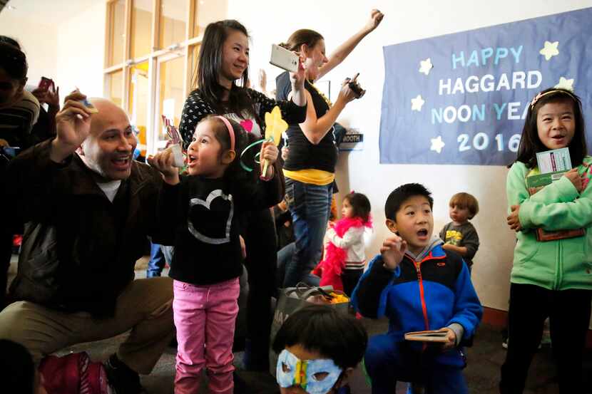 Youngsters at the Haggard Library in Plano celebrate at the Noon Year's Eve Party.