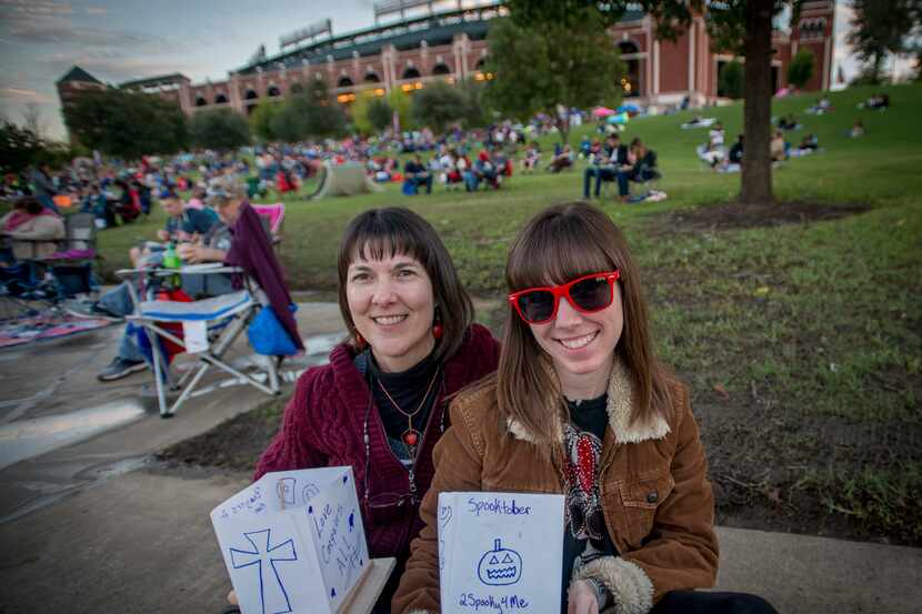 Tracie Matthews, left, and daughter Jordan Matthews with the water lanterns they prepared...