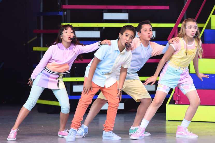 Members of Kidz Bop perform kid-friendly songs and dance. 