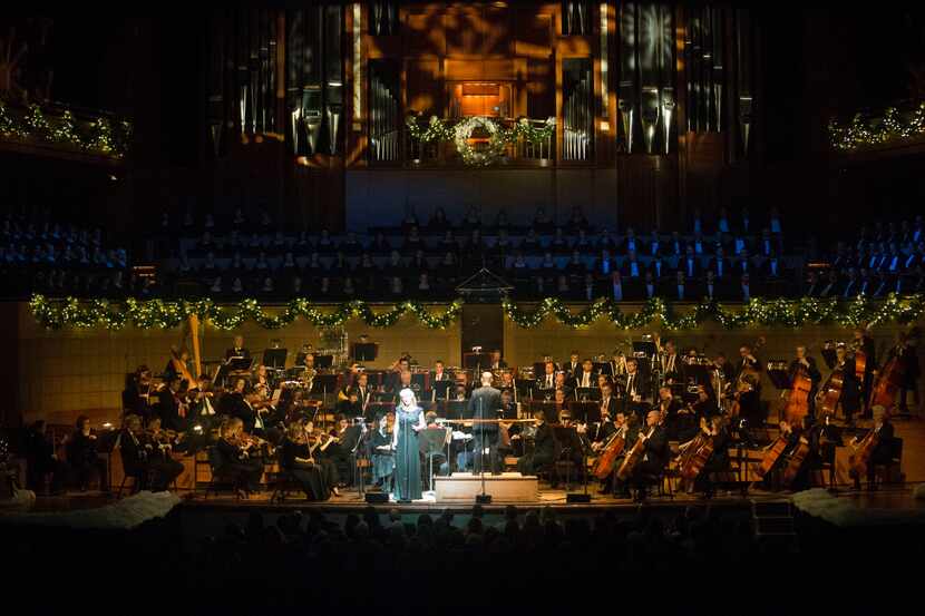 Soprano singer Katy Shackleton Williams, led by conductor Lawrence Loh, sings as the Dallas...