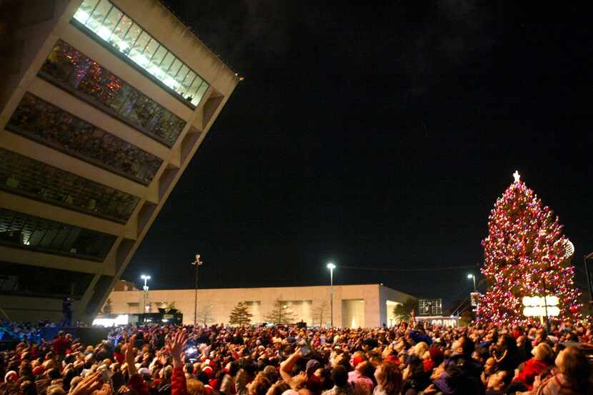 Thousands gather for the Christmas tree lighting ceremony at Dallas City Hall.