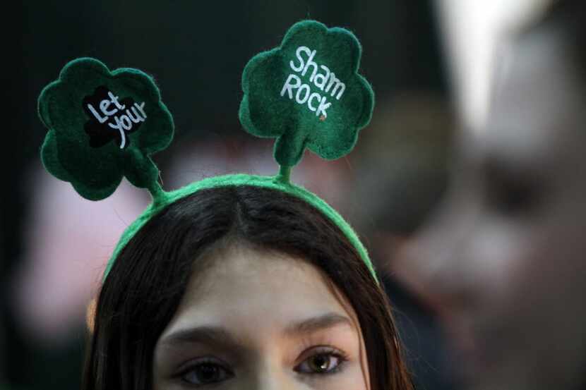 Cassidy Hunt wears a head band with clovers.