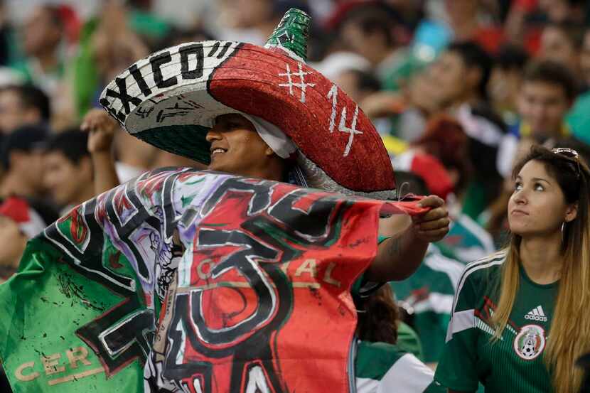 
A Mexico fan celebrated his team’s win against Ecuador in a 2018 exhibition match held at...