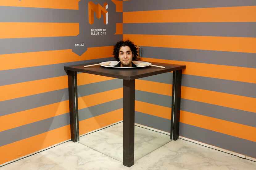 House magician Zac Mirzadeh demonstrates the Head on the Platter illusion at the Museum of...