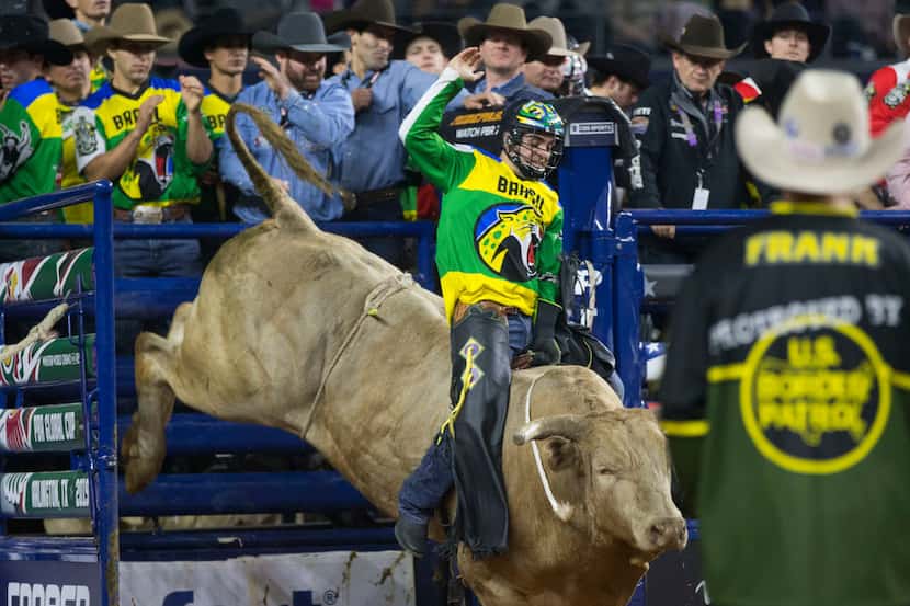 Bull rider Jose Vitor Leme of Team Brazil escapes the chute riding Rodeo Houston during the...