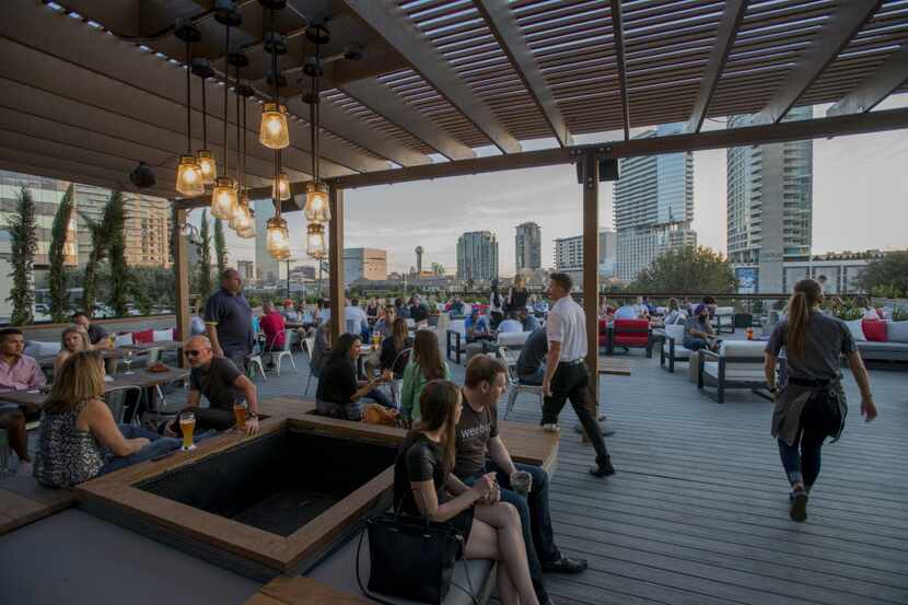 Happiest Hour features a rooftop terrace with 360-degree views of downtown Dallas. 