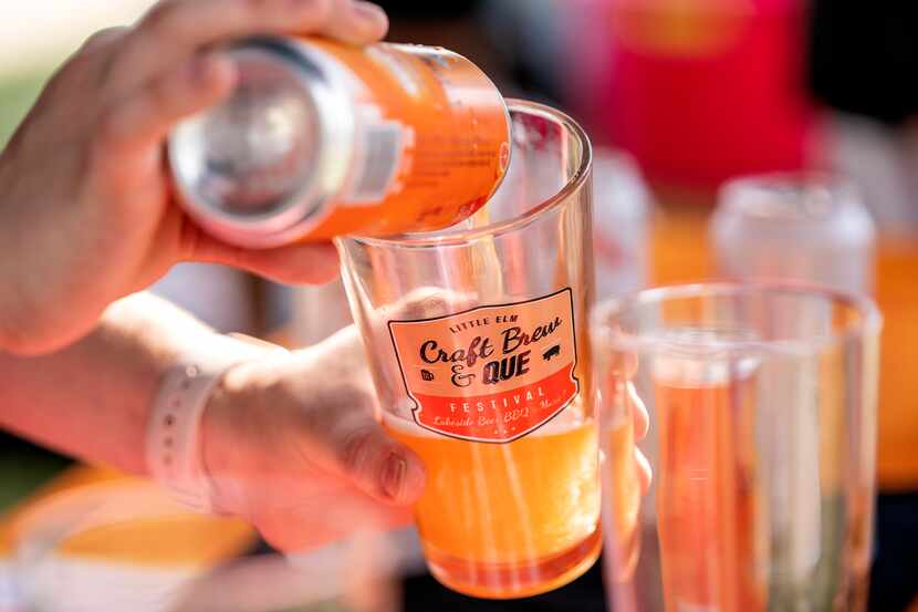 A beer is poured at the Little Elm Craft Brew and Que Festival.