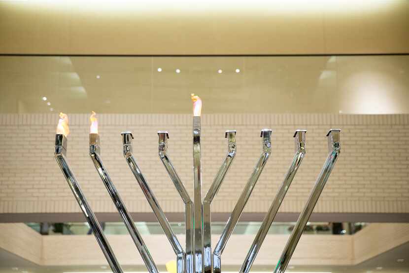 The Holidays at NorthPark decorations include a large menorah. 