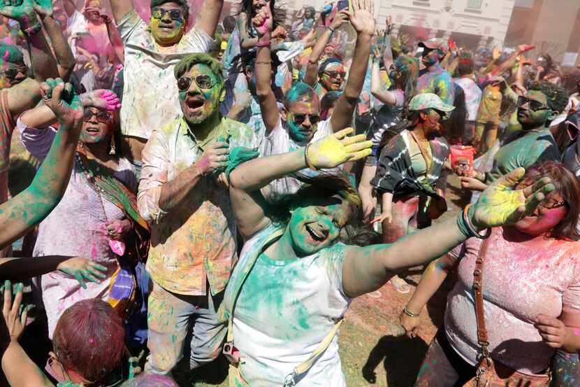 Community members take part in the Holi Celebration and Anand Bazaar at the DFW Hindu Temple...