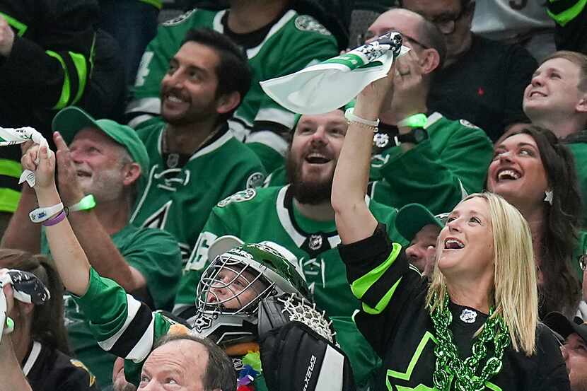 Dallas Stars fans cheer their team at the American Airlines Center in Dallas.