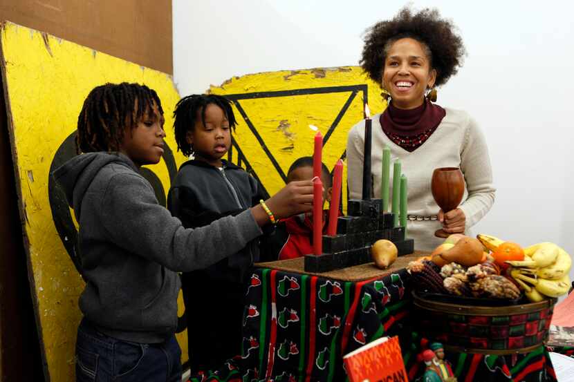 A Kwanzaa candle-lighting ceremony at the Pan-African Connection