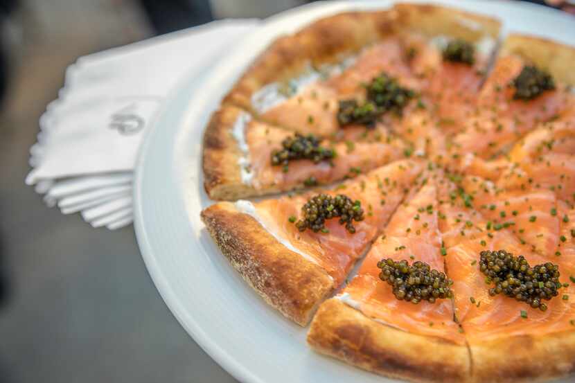 Chef Jett Mora plans to put classic Wolfgang Puck dishes like salmon pizza on the menu at...