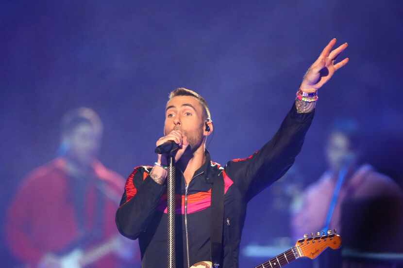 Maroon 5, with lead singer Adam Levine, performs during the Super Bowl Halftime Show at...