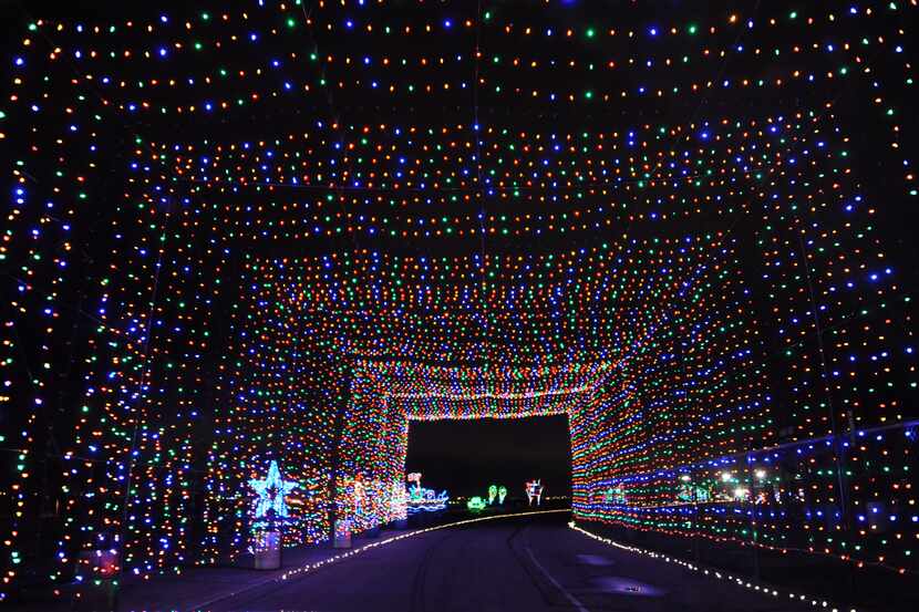 A tunnel of lights at Gift of Lights at Texas Motor Speedway