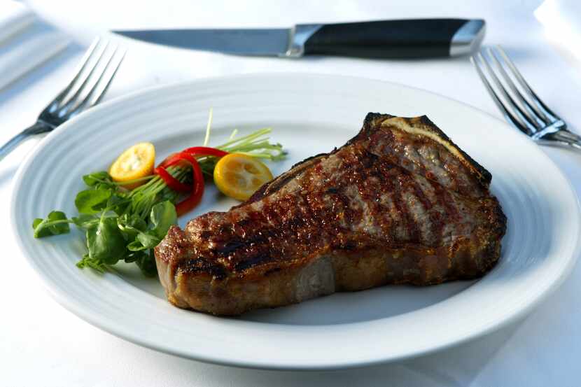Dry-aged 14 oz. New York Strip Steak is served at Dakota's Steakhouse in downtown Dallas.