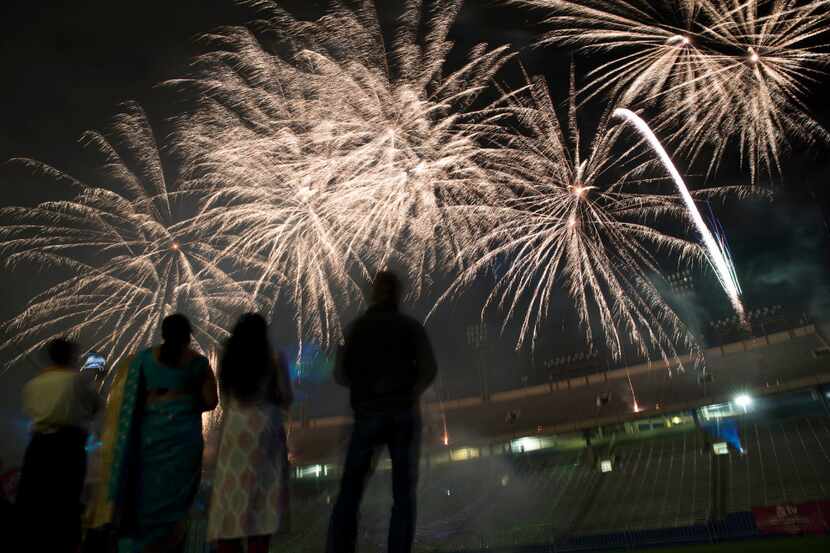 Fireworks go off in the Cotton Bowl during Diwali Mela.