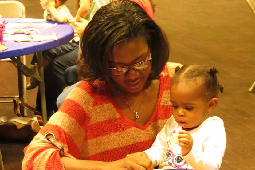 Families with young children work on crafts during one of Irving Arts Center's free events.