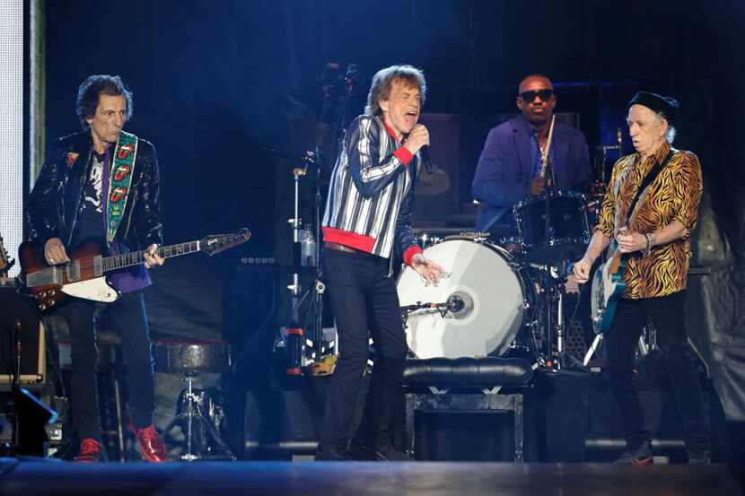 Singer Mick Jagger (center), drummer Steve Jordan (back), guitar players Keith Richards...