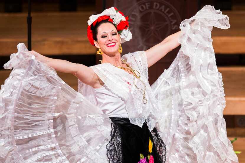 A dancer from Anita M. Martinez Ballet Folklorico performs.