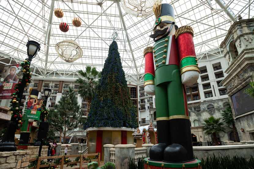 A variety of Christmas decorations are on display inside the atrium of the Gaylord Texan...