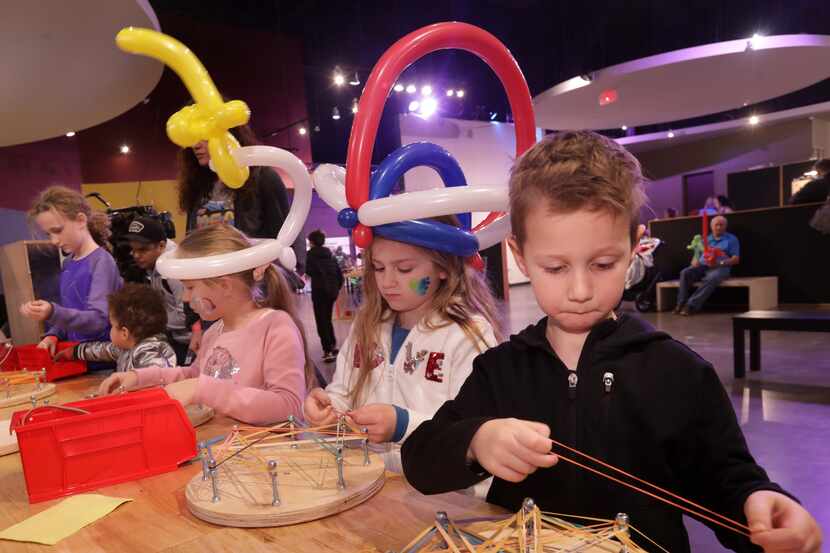 Guests enjoy a family-friendly New Year's Eve party at Sci-Tech Discovery Center.