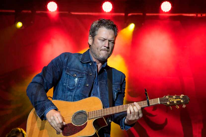 Blake Shelton performs during a free Opry style concert on Main Street outside of new...