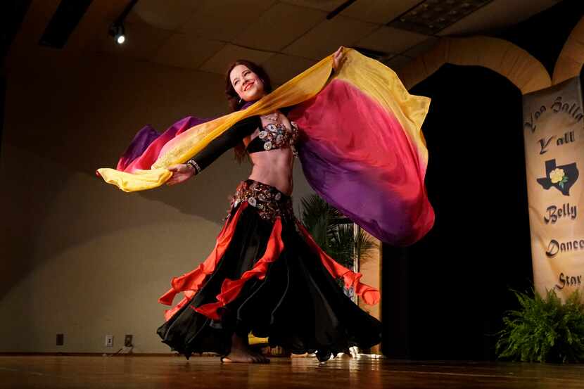 A dancer performs at the 2018 "Yaa Halla, Y'all" gatheraing at the convention center in...