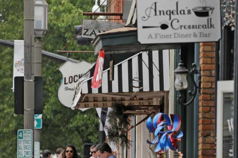 Quaint shops and eateries dot the landscape along 15th Street near Avenue K in historic...