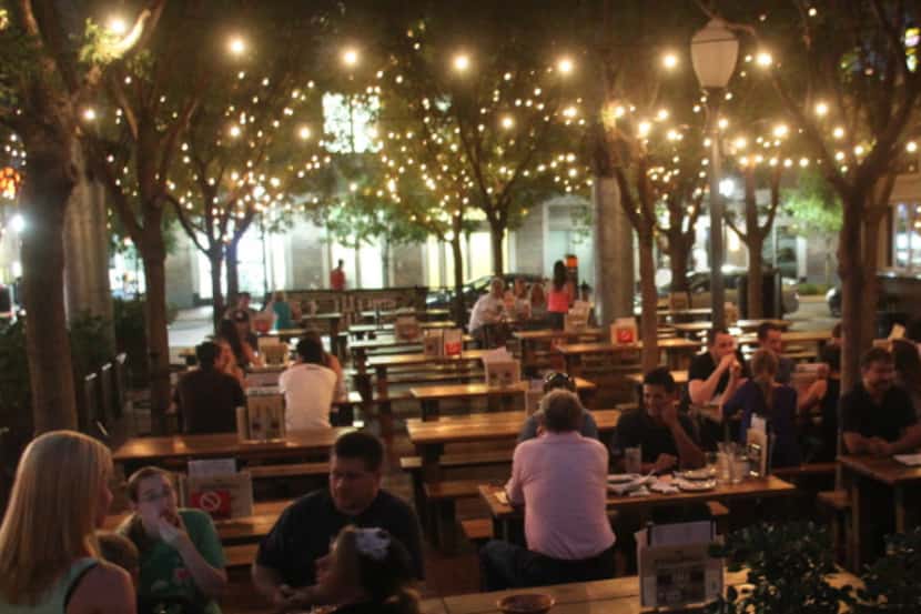 The outdoor beer garden at the Flying Saucer on Thursday, August 4, 2014.