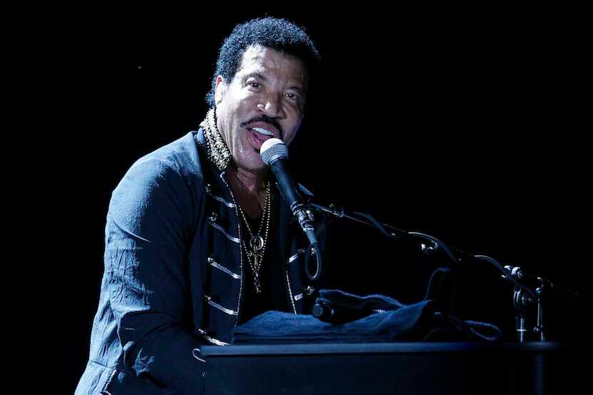 Lionel Richie performs for the crowd at Fair Park in Dallas on Tuesday, July 11, 2014. 