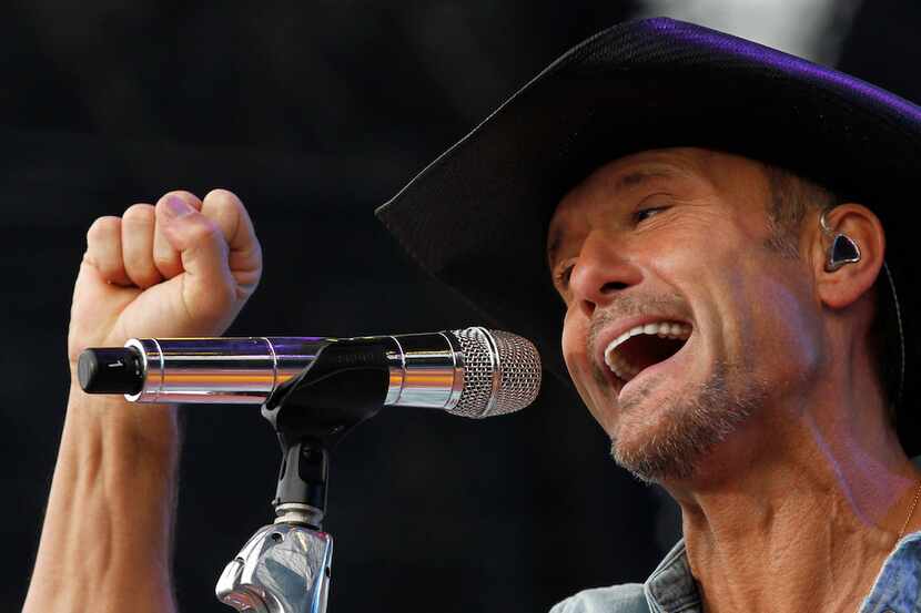 Tim McGraw sings during his performance at the March Madness Music Festival at Reunion Park...
