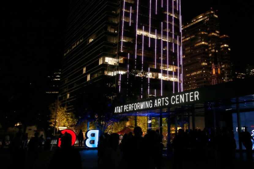 People watch the visual artwork called "Inc." by Tramaine Townsend as the KPMG Plaza...