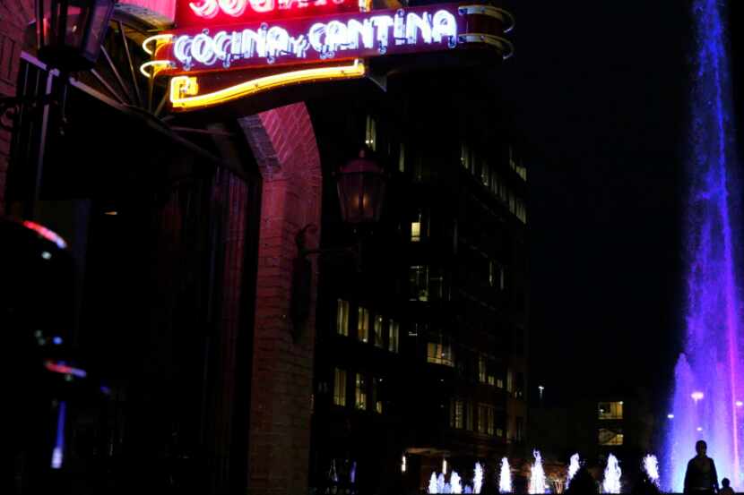 The Mexican Sugar sign and fountain light up The Shops at Legacy in Plano. 
