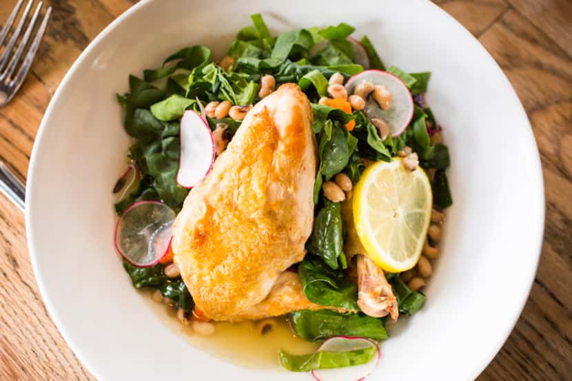 Roast chicken with greens and radishes by Andrea Shackelford at Harvest photographed on...