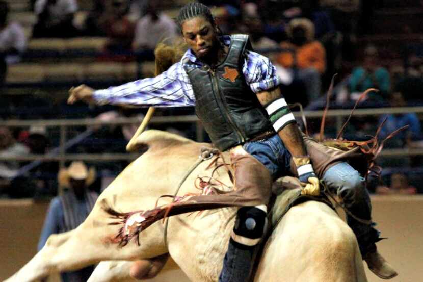 Bull rider Kendrick Mack competes at the 26th Annual Texas Black Invitational Rodeo. 