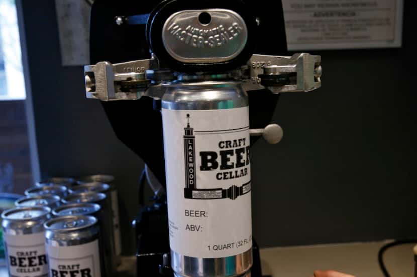 A crowler is filled at Craft Beer Cellar in Dallas on April 1, 2017.